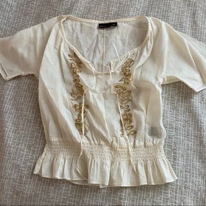 Embroidered cinched blouse